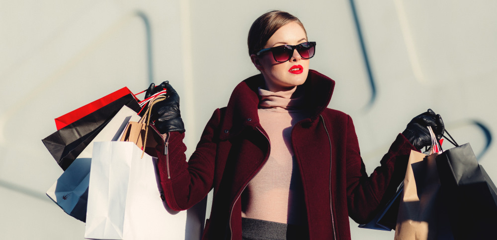 woman with many shopping bags