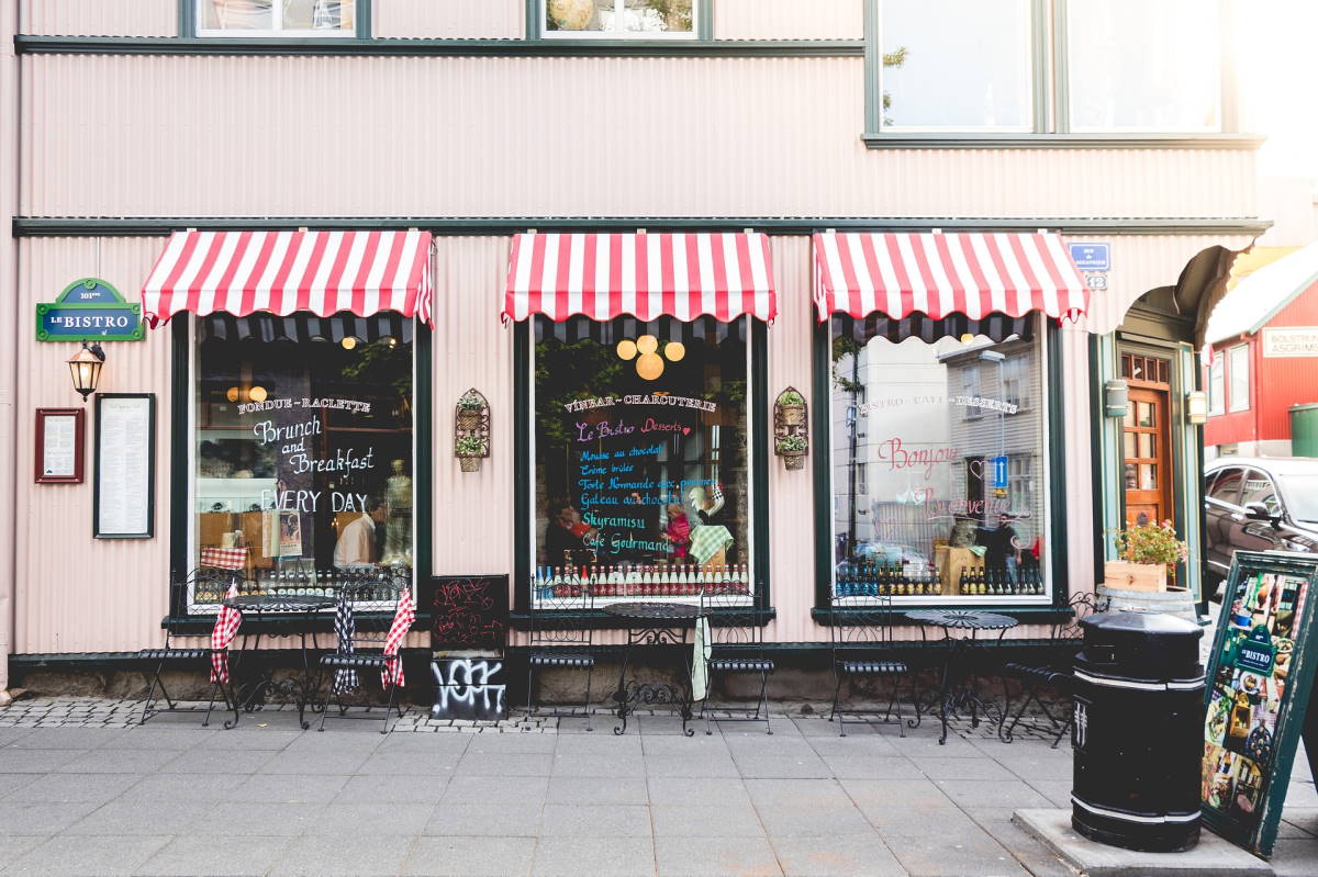 storefront with red and white awning