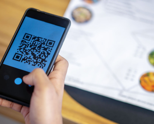 scanning a QR code at restaurant